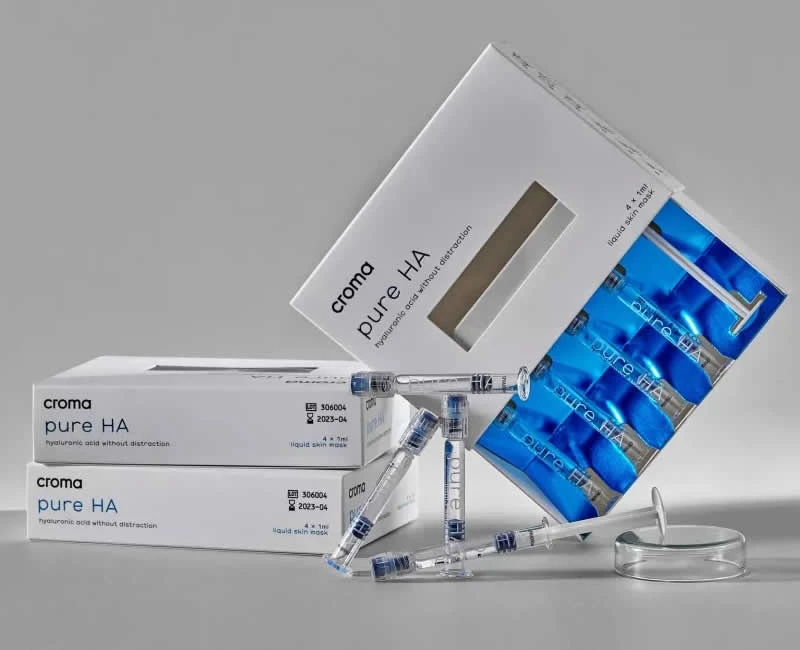 Una caja de jeringas para la incorporación de Croma Pure HA, ácido hialurónico, en la rutina de cuidado facial.